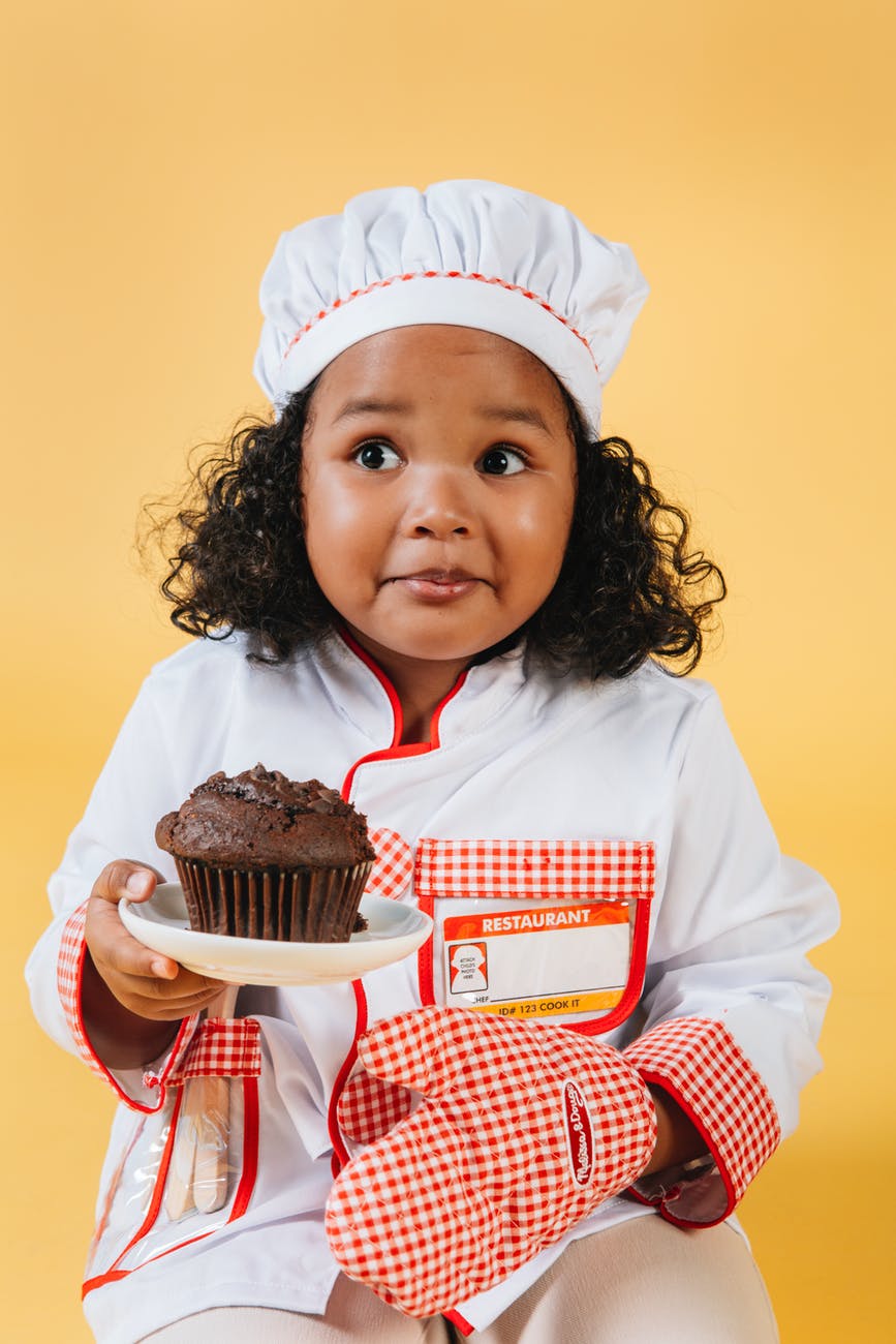 cute black girl in chef costume