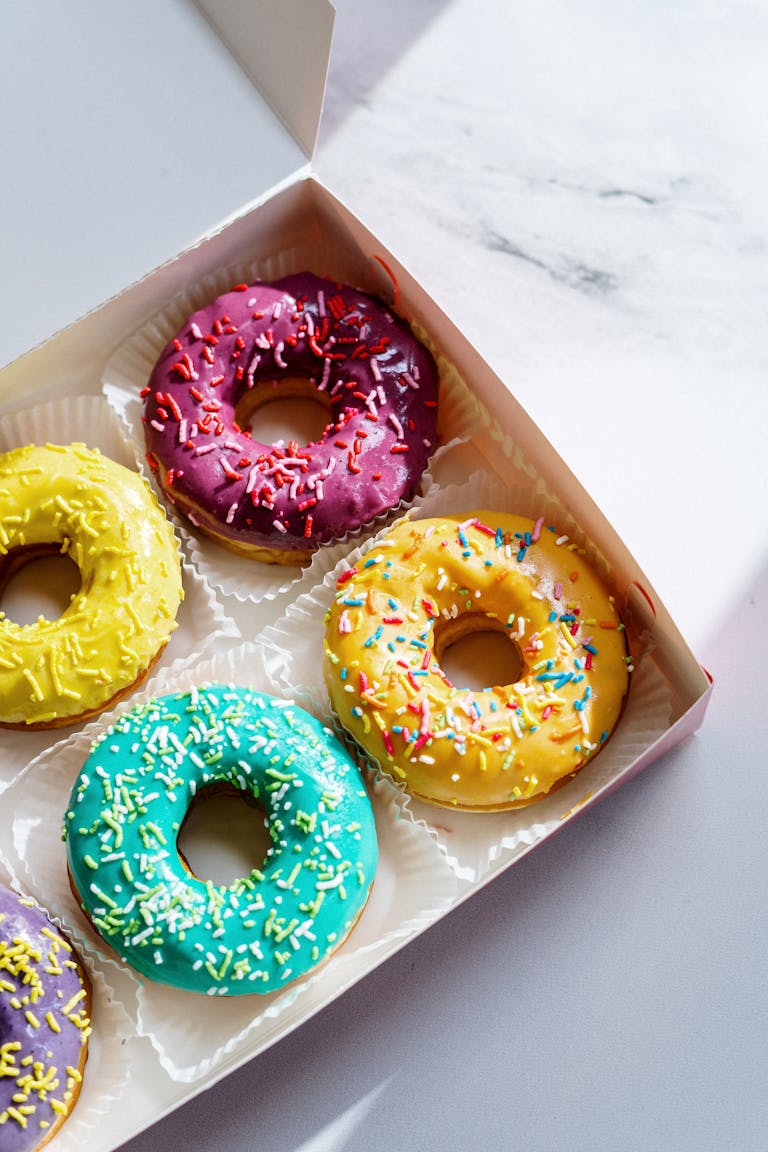 Two Doughnuts in Brown Box